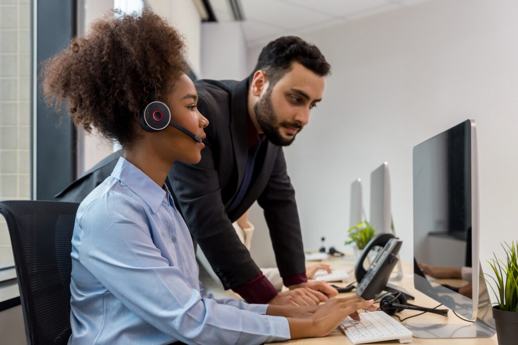 KLR engineers implementing a scalable hosted PBX solution in a fast-paced business office