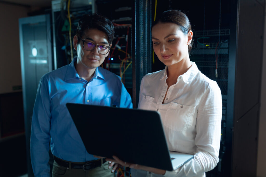 People in a KLR office working on a next gen firewall configuration