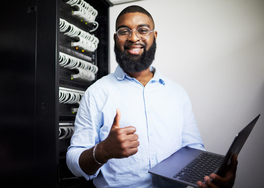 Technician at KLR installing a leased line for fast internet